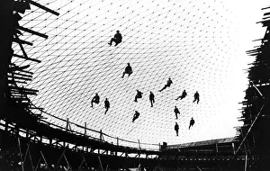 Workers build a net of steel, 1930s