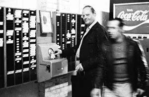 Workers and employees at the time clock of the Pohlschroeder company in Dortmund