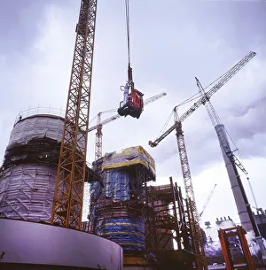 Workmen building a coal-fired power plant