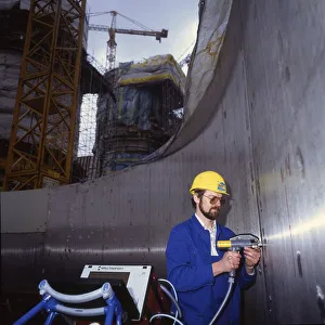 Workmen building a coal-fired power plant