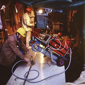 Workmen building a coal-fired power plant