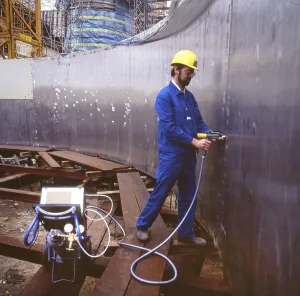 Workmen building a coal-fired power plant