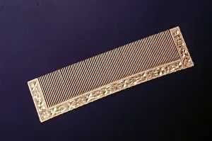 Sixty years old gold comb, india