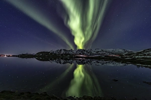 Category Mountain Landscapes Prints: Yellow and green northern lights reflected in fjord