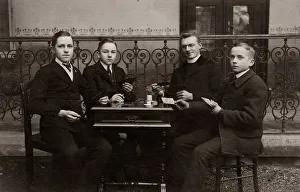 Young boys playing card, historic photo circa 1900