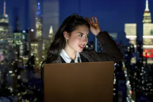 Young businesswoman working on laptop