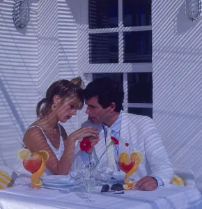 Young couple eating lovers restaurant, terrace