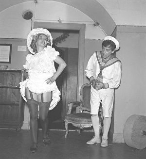 A young couple in odd clothes in the 1940s