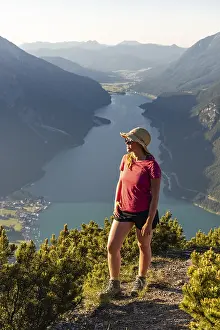 Young hiker, woman looking into the distance