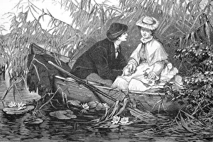 Young lovers sitting in a rowing boat
