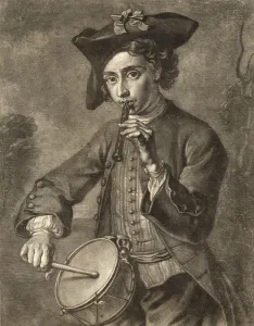 A Young Male Playing Drum and Fife