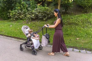 Young mother enjoying a sunny day in the park