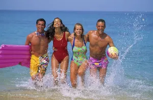 Young people bathing in the sea