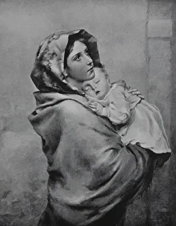 Young woman with a baby on her arm