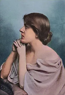 Young woman, folded hands, praying