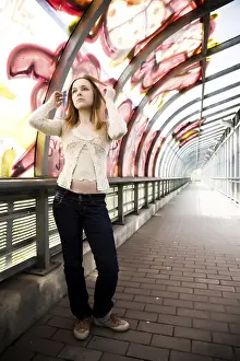 Young Woman In The Graffiti Painted Tunel