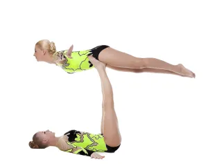 Two young woman show high gymnastic skill exercise isolated