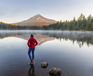 Young woman looking at view of volcano Mt