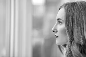 Serious young woman profile with copyspace
