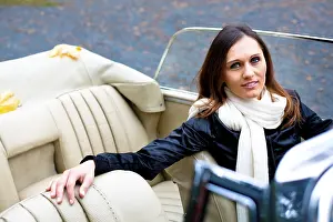 Young woman in a vintage car, MB 220 SE Cabriolet