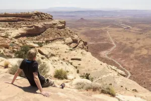 Youngster enjoying the view of the deserts of Monument valley in Arizona Utah in USA