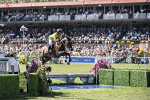 Category Historic EN Prints: Yuri Mansur of Brazil and riding QH Alfons Santo Antonio compete in the first round of the 1
