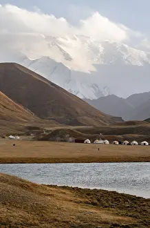 Yurts in front of Lenin Peak, Pamir Mountains