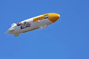 Zeppelin with Caterpillar advertising over Munich